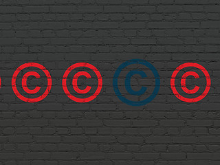 Image showing Law concept: copyright icon on wall background