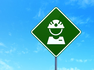 Image showing Industry concept: Factory Worker on road sign background