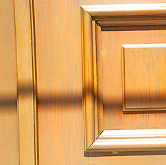 Image showing texture of a brown old door in italy europe