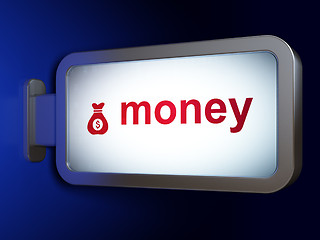 Image showing Finance concept: Money and Money Bag on billboard background