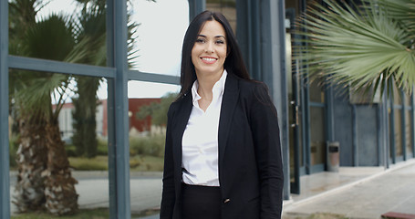 Image showing Smiling friendly young businesswoman