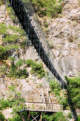 Image showing Suspension bridge in the mountains