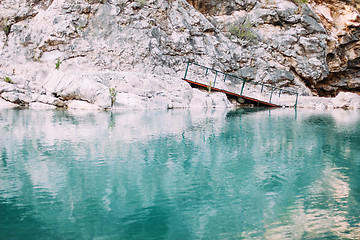 Image showing Bridge in the mountains with river