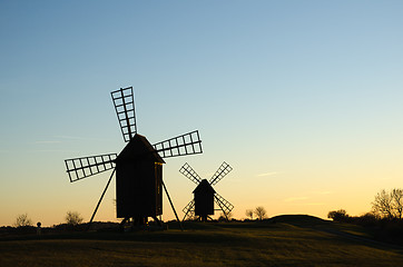 Image showing Old windmills in late evening sun