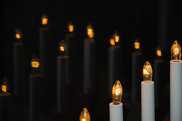 Image showing Reflecting electric candles