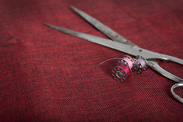 Image showing red fabric scissors