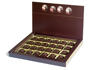 Image showing An open box of chocolates on a white background.