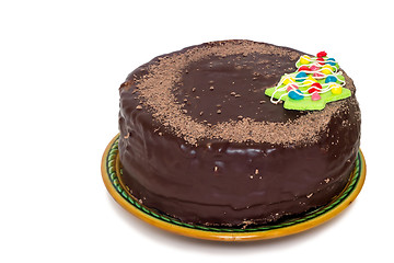 Image showing Chocolate cake on a ceramic dish on white background.