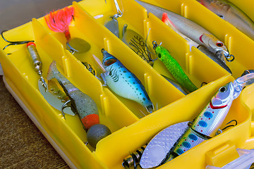 Image showing Fishing tackle: a set of spoons in the container.