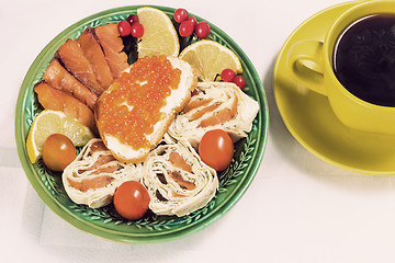 Image showing Snacks with fish and black coffee.