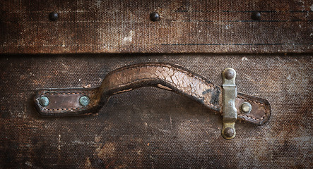 Image showing Old canvas trunk handle close up