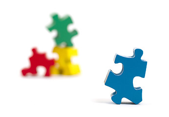 Image showing Closeup of big jigsaw puzzle piece, perspective