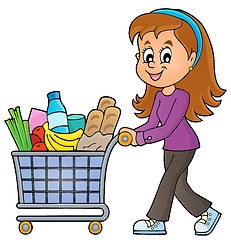 Image showing Woman with full shopping cart