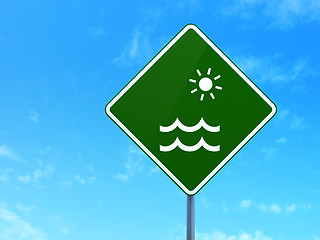 Image showing Travel concept: Beach on road sign background