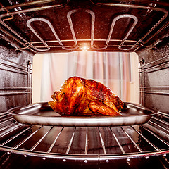 Image showing Roast chicken in the oven.