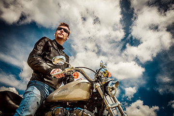 Image showing Biker on a motorcycle