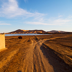 Image showing sunshine in the lake yellow  desert of morocco sand and     dune