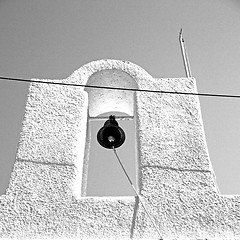 Image showing in cyclades      europe greece a cross the cloudy sky and bell