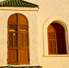 Image showing   yellow window in morocco africa old construction and brown wal