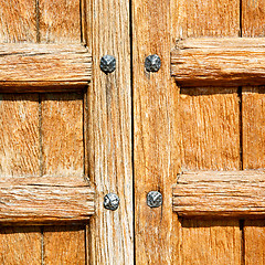 Image showing door in italy old ancian wood and trasditional  texture nail