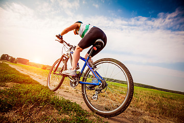 Image showing Women on bike