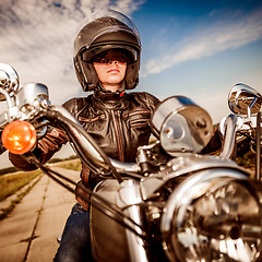 Image showing Biker girl on a motorcycle