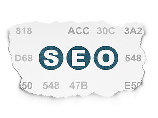 Image showing Web development concept: SEO on Torn Paper background