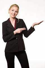 Image showing Woman pointing and holding