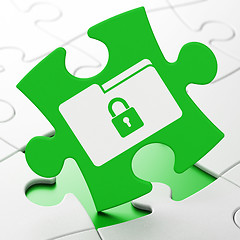 Image showing Business concept: Folder With Lock on puzzle background