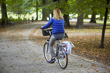 Image showing Woman on the bicycle in park