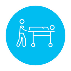 Image showing Man pushing stretchers line icon.