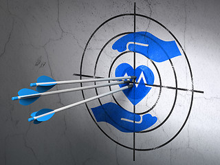 Image showing Insurance concept: arrows in Heart And Palm target on wall background