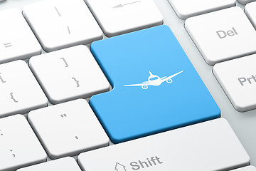 Image showing Travel concept: Aircraft on computer keyboard background