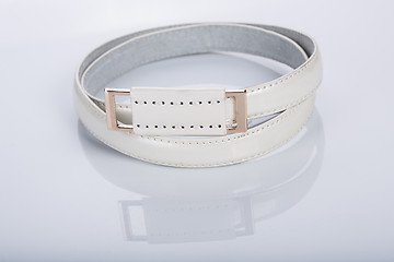 Image showing thin white female belt buckle with fine