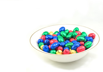 Image showing white bowl of easter eggs isolated on white background