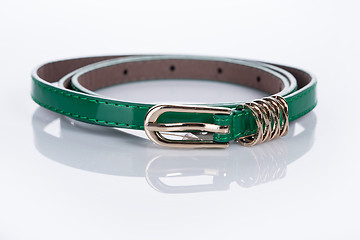 Image showing thin green female belt buckle with fine