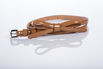 Image showing beige leather Women\'s belt with rhinestones