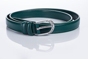 Image showing thin green female belt buckle with fine