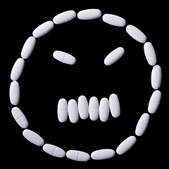 Image showing face of white oblong tablets 