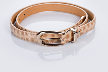 Image showing beige leather Women\'s belt with rhinestones