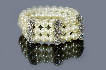 Image showing bracelet of pearls on a gray background