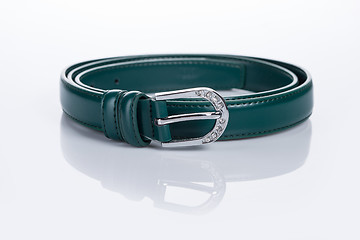 Image showing thin green female belt buckle with fine