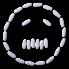 Image showing face of white oblong tablets 