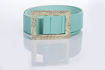 Image showing thin green female belt buckle with fine