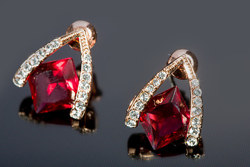 Image showing Pear Diamonds Earrings. red gems