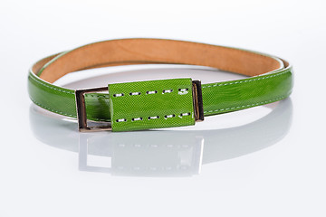 Image showing thin green female belt buckle with fine