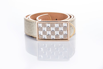 Image showing beige leather Women\'s belt with rhinestones