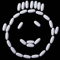 Image showing face of white oblong tablets 