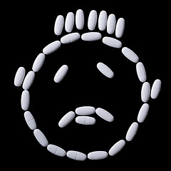 Image showing face of white oblong tablets 