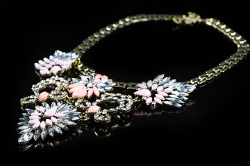 Image showing luxury necklace on black stand